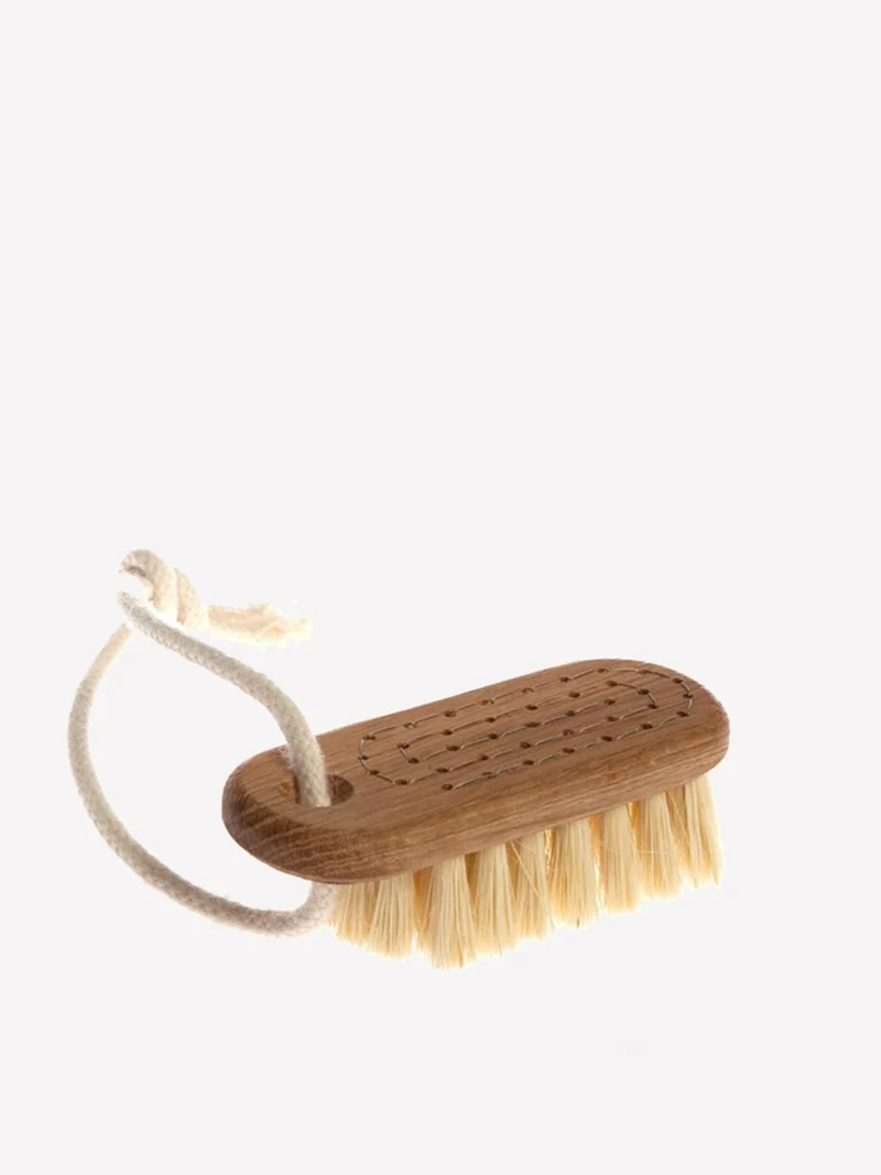 Nagelborste med snöre