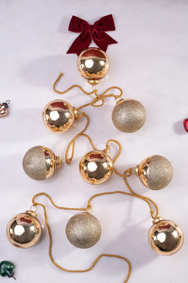 Gleam Garland Ornament · Gold