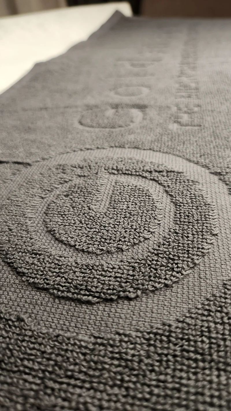 Goldeneye Grå handduk, woven-in logo, 70x20 cm